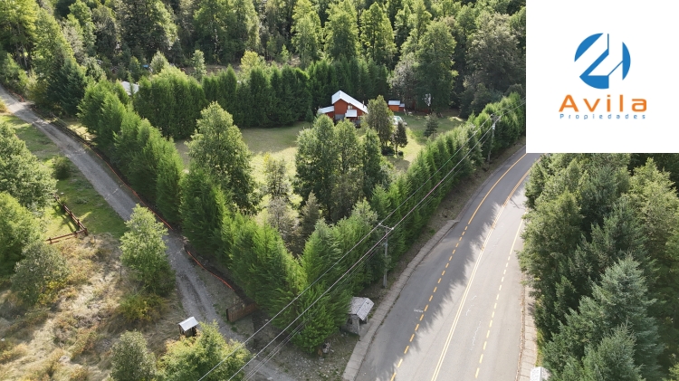Curarrehue sector Caren parcela de 5.100m2 con casa y piscina a un costado carretera COD.VTAP224