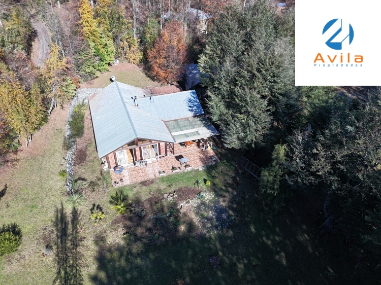 Pucón Candelaria parcela 9.000m2 orilla de camino con 2 construcciones COD.VTAP221