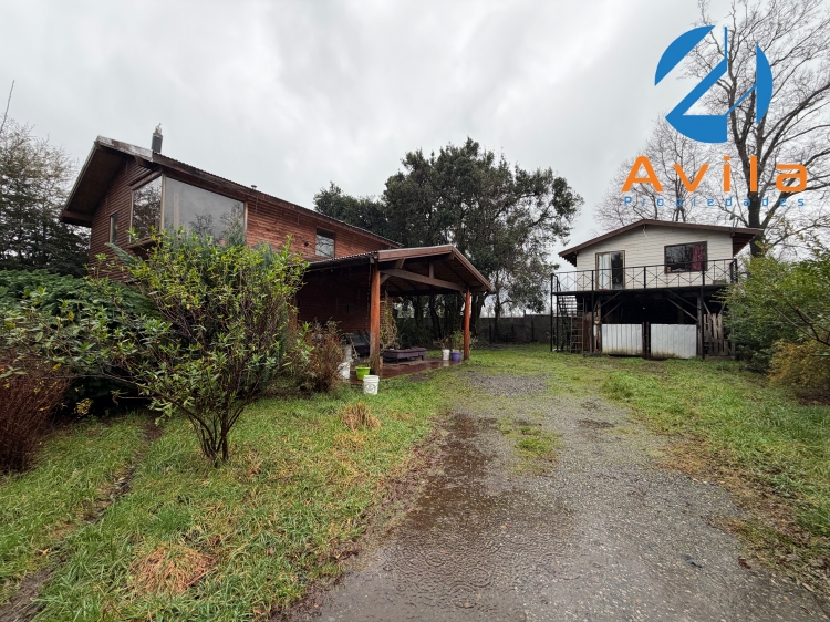 PUCON terreno de 664m2 con casa 115m2 + un departamento de 50m2 COD.VTIN104